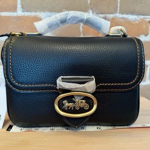 Stunning Coach Riley 22 Black Pebbled Leather. Never used. New condition.